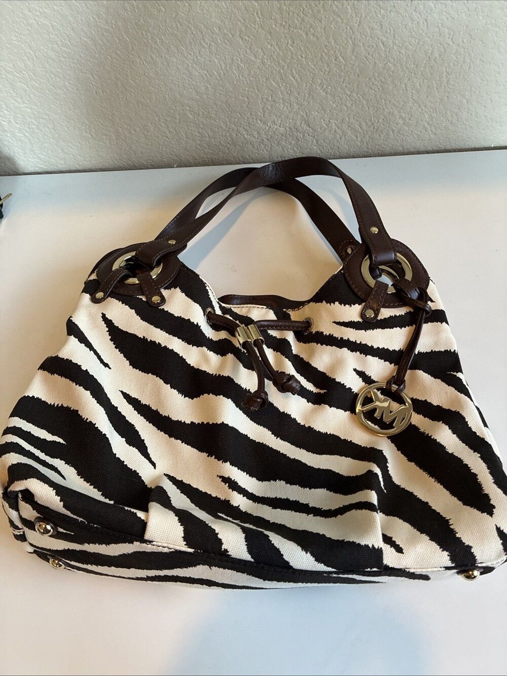 Michael Kors Zebra Marina Bucket Large Canvas Drawstring Tote Brown Leather